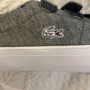 New with tags. Lacoste sneaker Velcro size 2 boy